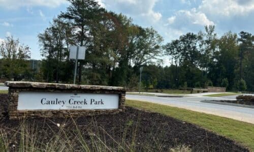 Cauley Creek Park front entrance sign in Johns Creek, Georgia.