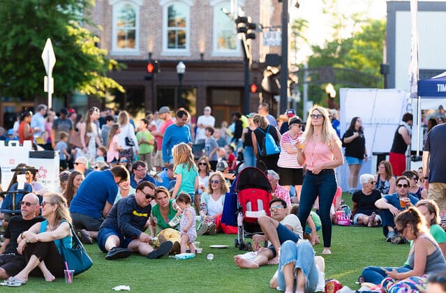 Visitors on lawn in Downtown Alpharetta