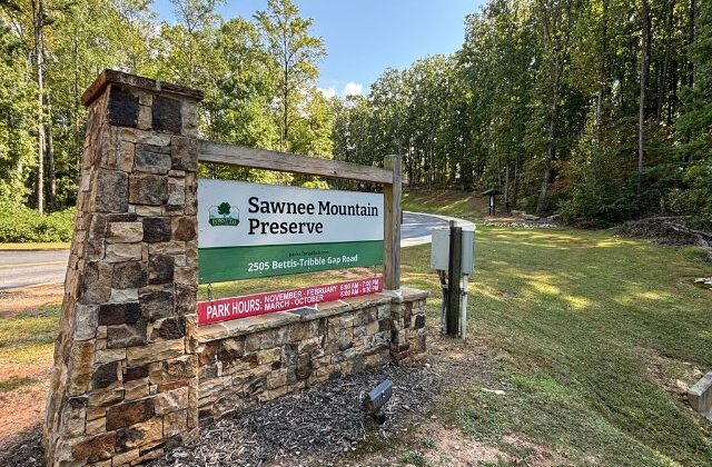 Front entrance sign of Sawnee Mountain Preserve in Cumming, Georgia